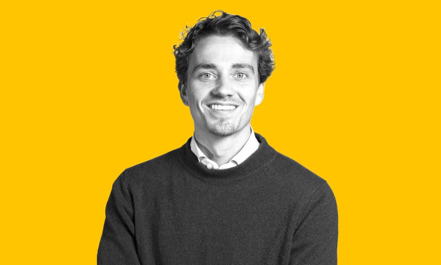 A picture of Diederick van der Wijk against a bright yellow background