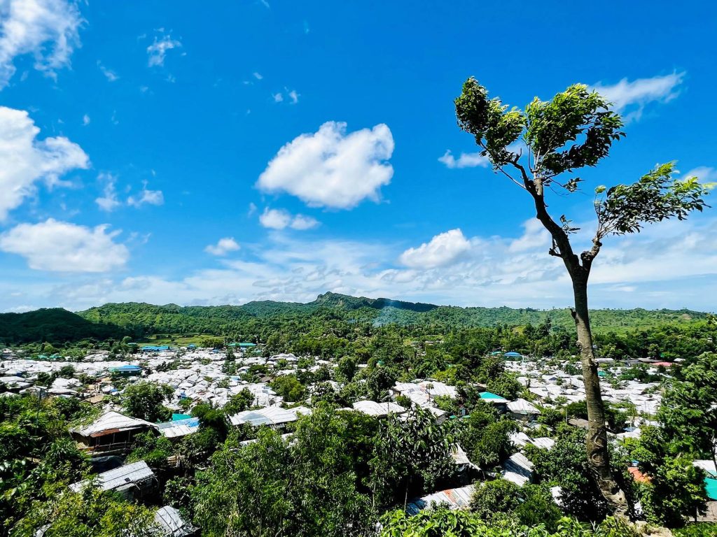 A view of
Unchiprang camp, close to the
Rohingya border. The camp is
a green ecosystem, providing a
livelihood for its communities. Photo by Ro Yassin Abdumonab, 2024.